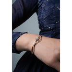 Elegant Wavy Gold Diamond Bangle