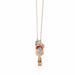 Graceful Bow and Stone Pendant