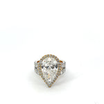 5 Carat Pear Solitaire Diamond Ring With Halo Design
